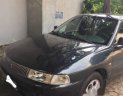 Mitsubishi Lancer 2002 - Cần bán Mitsubishi Lancer sản xuất 2002, màu đen ít sử dụng, giá tốt