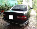 Toyota Corolla 2001 - Cần bán Toyota Corolla sản xuất 2001, màu xám số sàn 