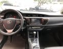 Toyota Corolla altis 1.8AT 2015 - Bán Altis 1.8 số tự động 2015, màu trắng