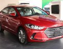 Hyundai Elantra 1.6 MT 2018 - Hyundai Elantra 1.6 MT màu đỏ, xe có sẵn, giao ngay, hỗ trợ vay trả góp đến 90% lãi suất cực ưu đãi. LH: 0903 175 312