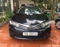 Toyota Corolla altis 1.8G 2015 - Cần bán gấp Toyota Corolla altis 1.8G năm sản xuất 2015, màu đen 