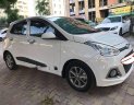 Hyundai Grand i10  1.2AT 2015 - Bán Hyundai Grand i10 1.2AT sản xuất năm 2015, màu trắng số tự động, giá chỉ 385 triệu