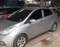 Hyundai Grand i10 Sedan 1.2MT 2018 - Bán Hyundai Grand i10 sedan 1.2MT bản đủ số sàn, sản xuất 2018, màu bạc, lăn bánh 4000km