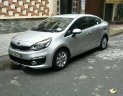 Kia Rio   1.4AT 2016 - Cần bán gấp Kia Rio 1.4AT đời 2016, màu bạc xe gia đình