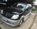 Mitsubishi Jolie 2004 - Cần bán lại xe Mitsubishi Jolie 2004, màu đen xe gia đình