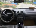 Ford Laser GHIA 1.8 MT 2003 - Bán Ford Laser GHIA 1.8 MT đời 2003, màu bạc