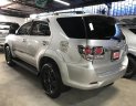 Toyota Fortuner V (4x2) 2016 - Bán Fortuner V 9/2016 màu bạc, giá còn thương lượng