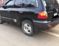 Hyundai Santa Fe 2003 - Bán Hyundai Santa Fe đời 2003, màu đen xe gia đình, giá tốt