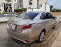 Toyota Vios E 2016 - Cần bán xe Toyota Vios (1.5 E) CVT, sản xuất 2016, màu ghi-vàng, gia đình sử dụng mới 98%