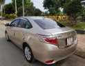 Toyota Vios E 2016 - Cần bán xe Toyota Vios (1.5 E) CVT, sản xuất 2016, màu ghi-vàng, gia đình sử dụng mới 98%