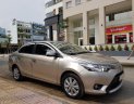 Toyota Vios E 2016 - Cần bán xe Toyota Vios (1.5 E) CVT, sản xuất 2016, màu ghi-vàng, gia đình sử dụng mới 98%