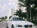 BMW 3 Series 325i   2009 - Bán xe BMW 325i convertible năm 2009, màu trắng, xe nhập mới chạy 51000km