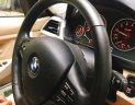 BMW 3 Series 320i 2012 - Cần bán xe BMW 3 Series 320i đời 2012, màu đen, xe nhập số tự động, giá chỉ 800 triệu