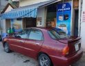 Daewoo Lanos 2002 - Gia đình bán Daewoo Lanos đời 2002, màu đỏ