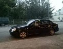 Daewoo Lacetti CDX 1.8   2004 - Bán xe Daewoo Lacetti CDX 1.8 2004, màu đen, 138 triệu