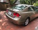 Honda Civic 1.8 MT 2008 - Cần bán gấp Honda Civic 1.8 MT đời 2008, màu vàng xe gia đình, giá tốt