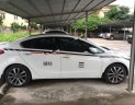 Kia K3 2014 - Bán ô tô cũ Kia K3 sản xuất 2014, màu trắng chính chủ 