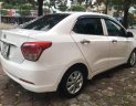 Hyundai Grand i10 2016 - Cần bán gấp Hyundai Grand i10 sản xuất năm 2016, màu trắng chính chủ