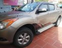 Mazda BT 50 2015 - Cần bán Mazda BT 50 sản xuất năm 2015, màu vàng, nhập khẩu, số sàn