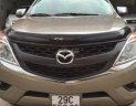Mazda BT 50 2015 - Cần bán Mazda BT 50 sản xuất năm 2015, màu vàng, nhập khẩu, số sàn