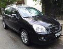 Kia Carens 2011 - Cần bán lại xe Kia Carens sản xuất 2011, màu đen số tự động