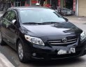 Toyota Corolla altis MT 2009 - Cần bán gấp Toyota Corolla altis MT sản xuất năm 2009, màu đen giá cạnh tranh