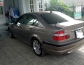 BMW 3 Series 325i 2003 - Cần bán gấp BMW 3 Series 325i đời 2003, màu vàng