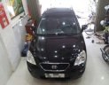 Kia Carens     2011 - Cần bán lại xe Kia Carens đời 2011, màu đen, số tự động 4 cấp