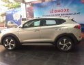 Hyundai Tucson  2.0AT 2018 - Bán ô tô Hyundai Tucson đời 2018, màu vàng giá tốt