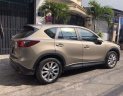 Mazda CX 5 2.0 2014 - Cần bán xe Mazda CX 5 2.0 đời 2014, màu nâu ít sử dụng