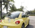 Volkswagen Beetle   2016 - Chính chủ bán Volkswagen Beetle 2016, màu vàng, nhập khẩu