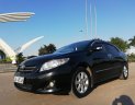 Toyota Corolla altis 1.8G 2009 - Cần bán gấp Toyota Corolla Altis 1.8G sản xuất 2009, màu đen xe gia đình, giá tốt 460 triệu