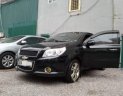 Chevrolet Aveo MT 2014 - Cần bán lại xe Chevrolet Aveo MT năm 2014, màu đen số sàn 