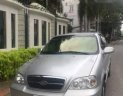 Kia Carnival 2009 - Bán Kia Carnival đời 2009, màu bạc xe gia đình