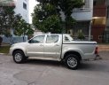 Toyota Hilux 2.5E 4x2 MT 2014 - Bán lại xe Toyota Hilux màu bạc, máy dầu, số sàn, 1 cầu, sản xuất 2014