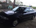 Ford Laser Delu 1.6 MT 2001 - Cần bán gấp Ford Laser Delu 1.6 MT sản xuất 2001, màu đen, giá 150tr