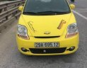 Chevrolet Spark MT 2009 - Bán xe Chevrolet Spark MT sản xuất 2009, màu vàng, giá 98tr