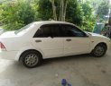 Ford Laser LX 1.6 MT 2000 - Bán Ford Laser LX 1.6 MT đời 2000, màu trắng xe gia đình, giá tốt