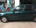 Ford Laser Deluxe 2001 - Cần bán gấp Ford Laser Deluxe đời 2001, màu xanh lục