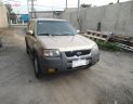 Ford Escape XLT  2003 - Cần bán Ford Escape XLT đời 2003, màu vàng cát, số tự động, giá chỉ 165 triệu