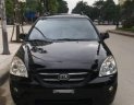 Kia Carens  1.6MT 2010 - Cần bán lại xe Kia Carens 1.6MT sản xuất 2010, màu đen số sàn