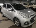 Hyundai Grand i10 1.0MT 2015 - Bán Hyundai i10 1.0MT màu bạc số sàn, nhập Ấn Độ 2015, bản 5 cửa, gia đình, xe chạy 38000km