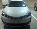 Toyota Corolla altis 1.8E CVT 2018 - Bán ô tô Toyota Corolla altis 1.8E CVT đời 2018, màu trắng giá cạnh tranh