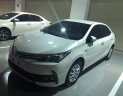 Toyota Corolla altis 1.8E CVT 2018 - Bán ô tô Toyota Corolla altis 1.8E CVT đời 2018, màu trắng giá cạnh tranh