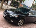 Kia Forte SLi 1.6 AT 2009 - Cần bán lại xe Kia Forte SLi 1.6 AT đời 2009, màu đen, nhập khẩu