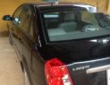 Daewoo Lacetti 2009 - Cần bán gấp Daewoo Lacetti đời 2009, màu đen