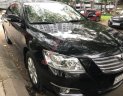 Toyota Camry 2.4G 2009 - Bán ô tô Toyota Camry 2.4G sản xuất năm 2009, màu đen, giá 590tr