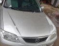 Mazda 323 2004 - Bán ô tô Mazda 323 2004, màu bạc như mới