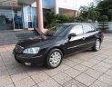 Ford Mondeo 2.0 AT 2005 - Cần bán gấp Ford Mondeo 2.0 AT năm sản xuất 2005, màu đen i