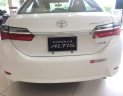 Toyota Corolla altis  1.8E   2018 - Bán ô tô Toyota Corolla altis 1.8E đời 2018, màu trắng, 718tr